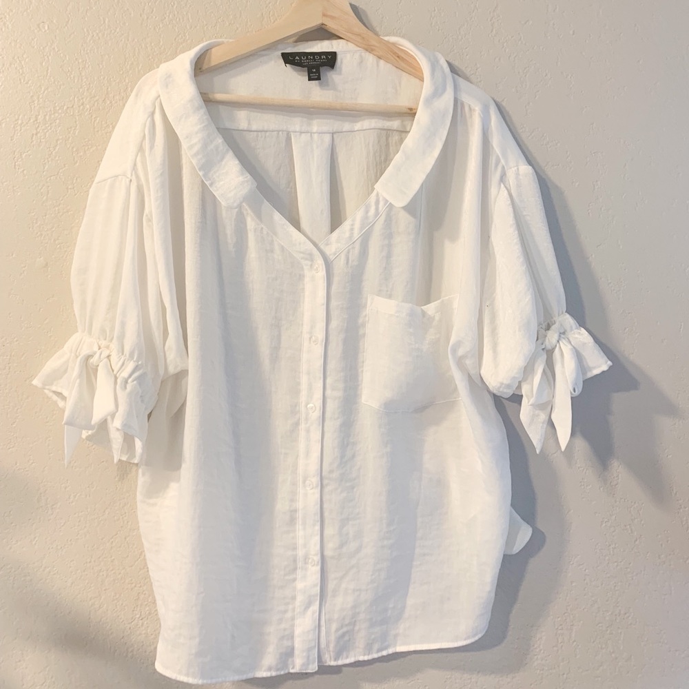 Crisp white Laundry button down with bow sleeves.